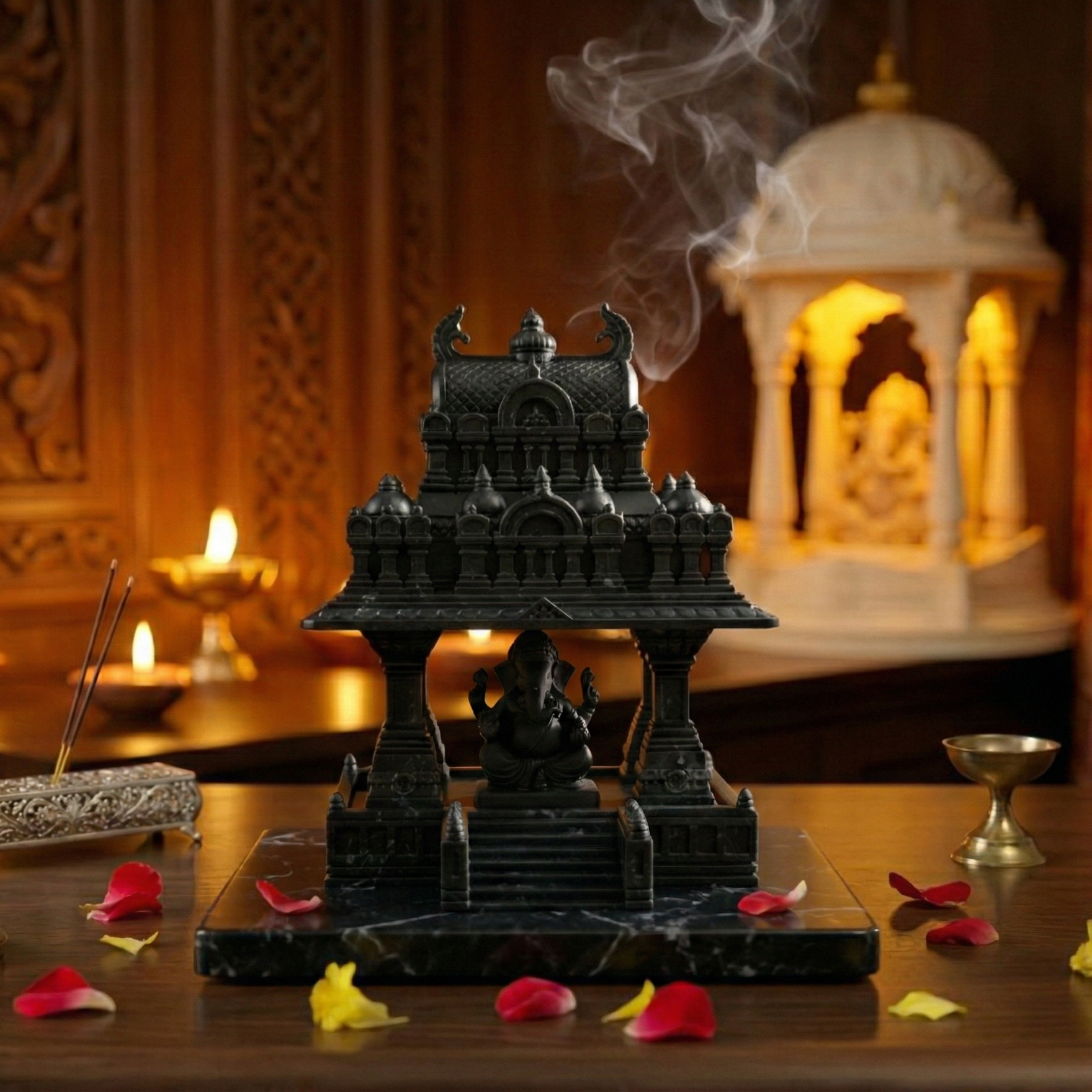 Black temple-like structure with incense and flowers on a wooden table, with a blurred background of candles and decor.