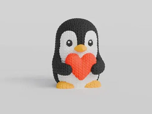 Pippin knitted penguin holding heart – gray colour variant