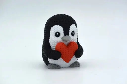 Pippin penguin sculpture close-up detail – brown finish
